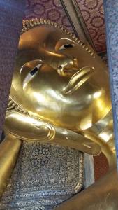 The head of an immense reclining Buddha at Wat Pho